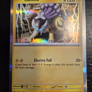 Pokemon Raikou Holographic Card - Yellow & Purple Accents